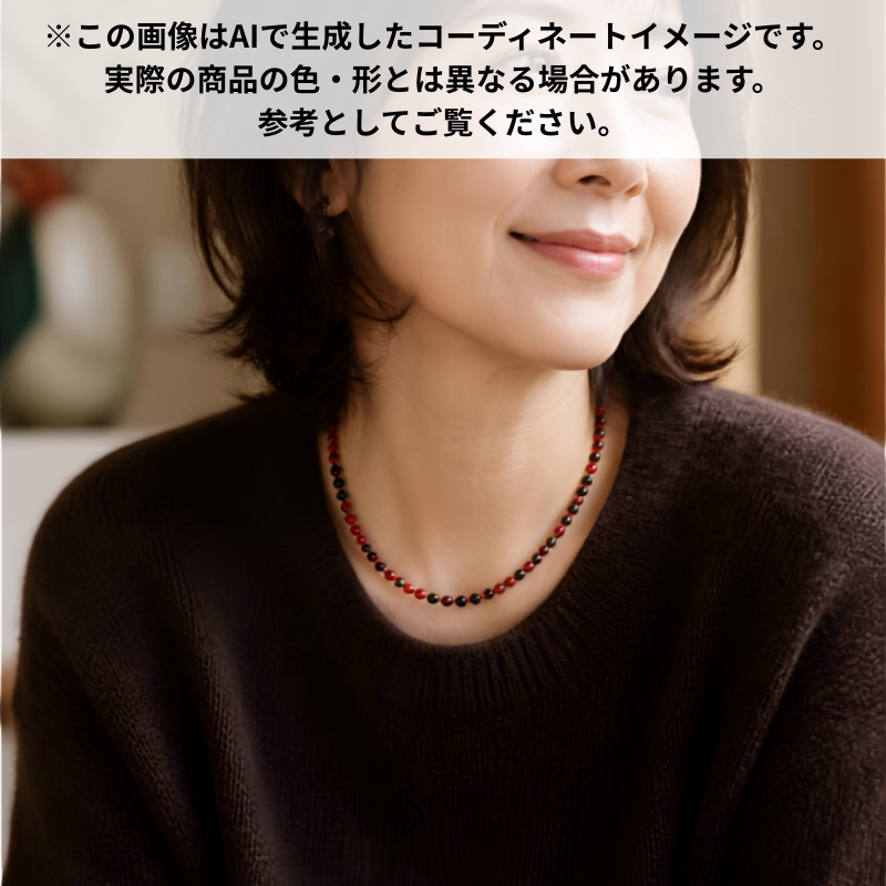 Red coral and black onyx necklace styled with dark brown knit sweater, AI-generated coordinate image